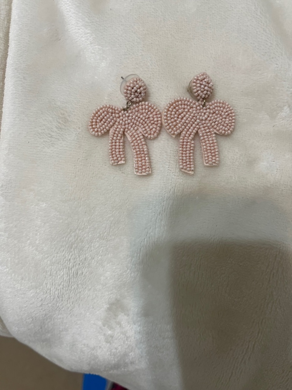 Pink beaded bow earrings